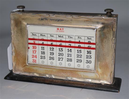 A 1920s silver mounted desktop calendar, height 5in.